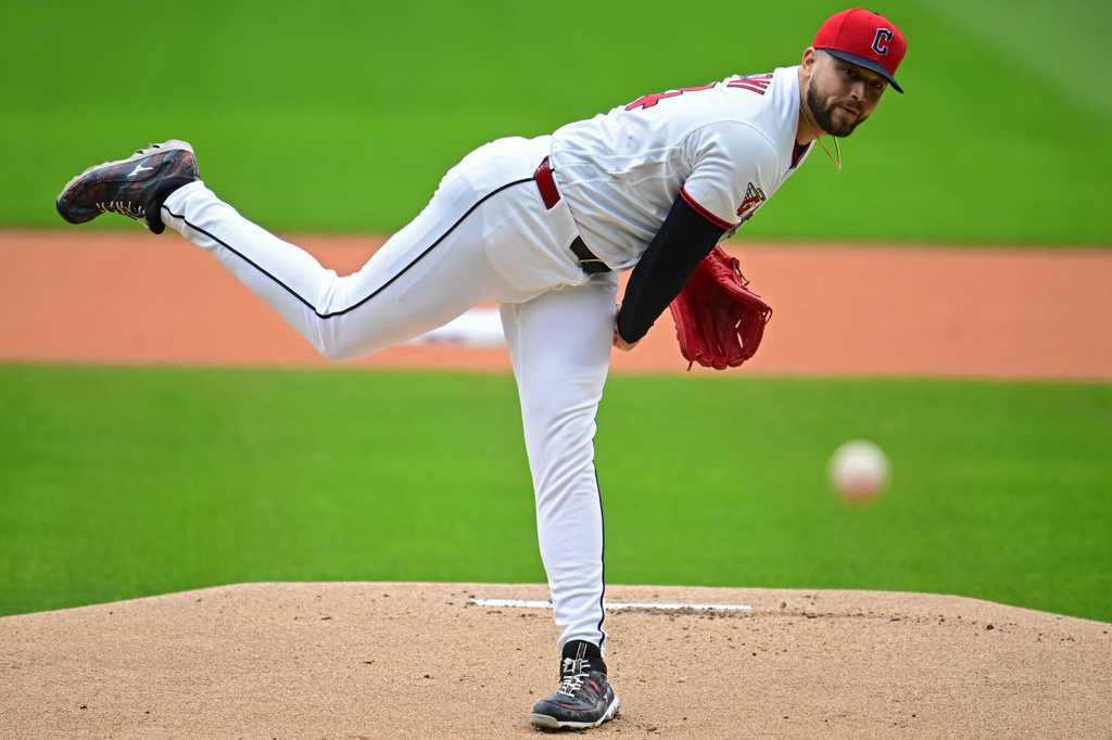 Cleveland Guardians starting pitcher Slade Cecconi delivers against the Chicago Cubs during the first inning of a baseball game, Sunday, April 5, 2026, in Cleveland. (AP Photo/David Dermer)