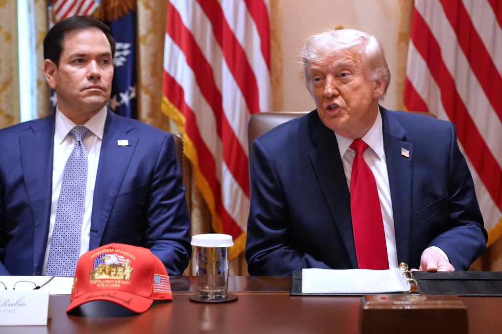 President Donald Trump, next to Secretary of State Marco Rubio, speaks during a Cabinet meeting at the White House, Wednesday, May 27, 2026, in Washington. (AP Photo/Jacquelyn Martin)