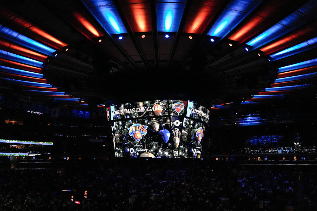 A screen displays "Christmas Day Game" before an NBA basketball game between the New York Knicks and the Cleveland Cavaliers, Thursday, Dec. 25, 2025, in New York. (AP Photo/Yuki Iwamura)