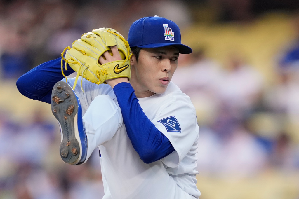 Los Angeles Dodgers starting pitcher Roki Sasaki throws to the plate during the first inning of a baseball game against the Los Angeles Angels, Friday, June 5, 2026, in Los Angeles. (AP Photo/Mark J. Terrill)