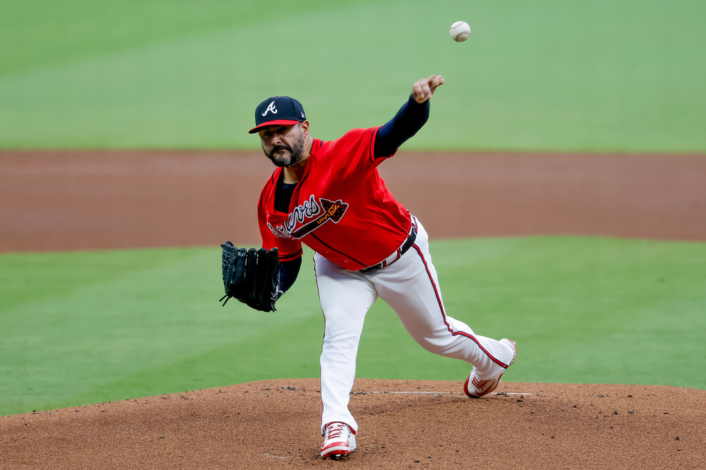 Atlanta Braves pitcher Martín Pérez delivers to a Milwaukee Brewers batter during the first inning of a baseball game, Friday, June 19, 2026, in Atlanta. (AP Photo/Erik S. Lesser)