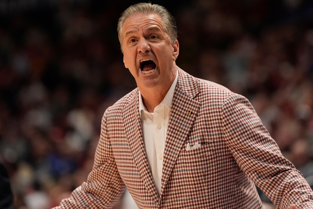 Arkansas head coach John Calipari speaks during the first half of an NCAA college basketball game in the quarterfinal round of the Southeastern Conference tournament against Oklahoma, Friday, March 13, 2026, in Nashville, Tenn. (AP Photo/George Walker IV)