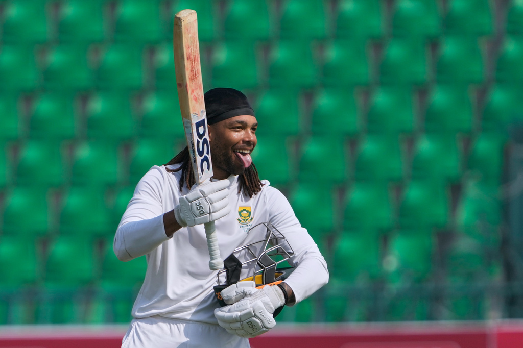 South Africa's Tony dy Zorzi celebrates after scoring century during the third day of the first test cricket match between Pakistan and South Africa, in Lahore, Pakistan, Tuesday, Oct. 14, 2025. (AP Photo/K.M. Chaudary)