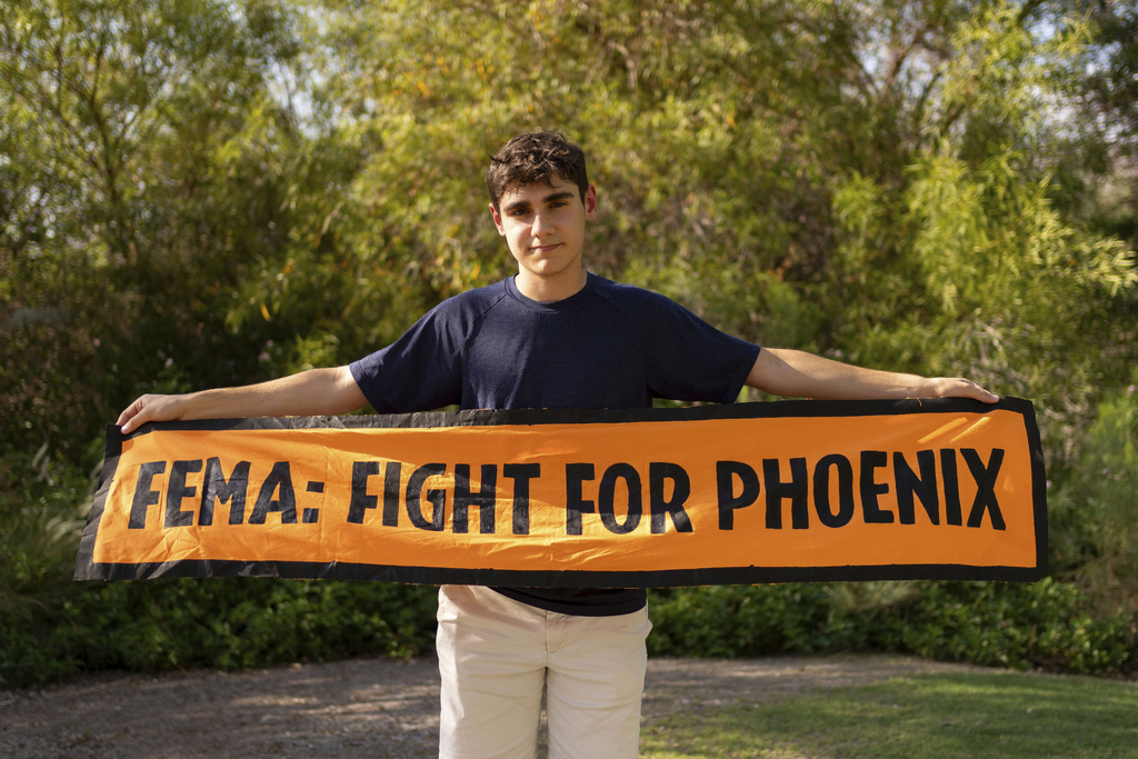 Ashton Dolce poses for a portrait at Cholla Park on Saturday, Aug. 9, 2025, in Scottsdale, Ariz. (AP Photo/Rebecca Noble)