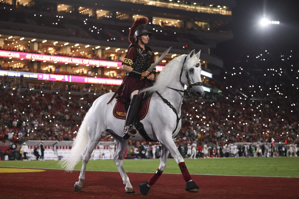 The Southern California horse mascot, Traveler, walks on the field during the second half of NCAA college football game against Michigan State, Saturday, Sept. 20, 2025, Los Angeles. (AP Photo/Jessie Alcheh)
