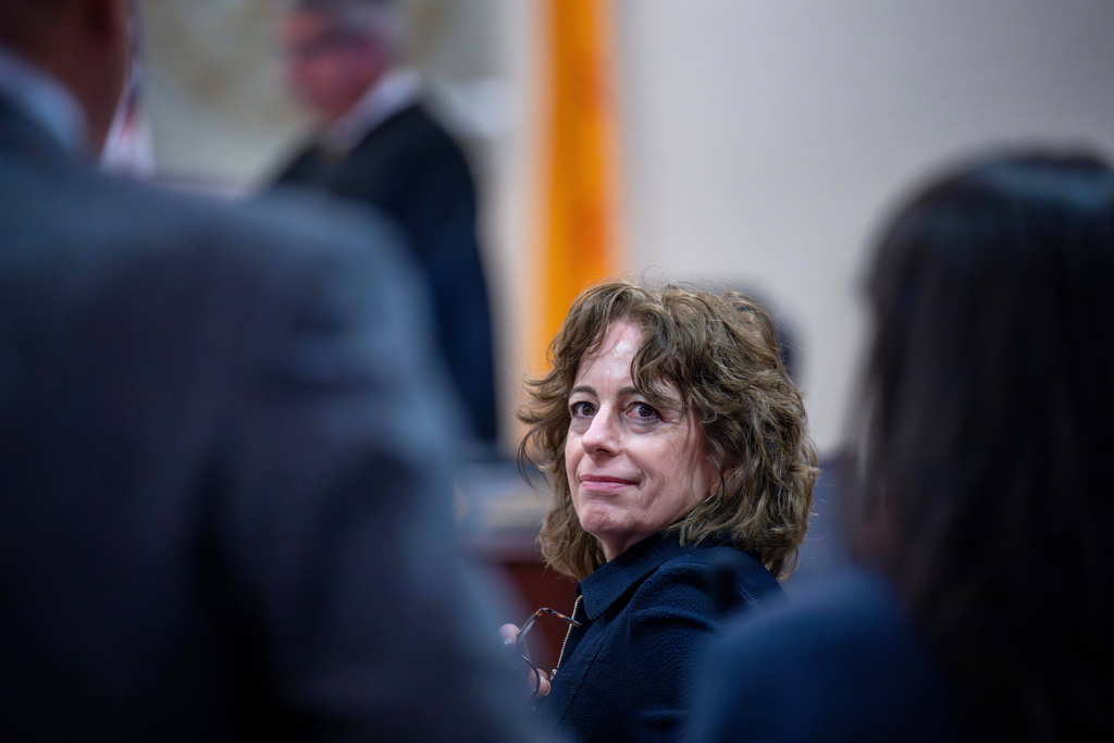 Linda Singer, an attorney representing the plaintiff, looks back at her co-counsel after making closing arguments, Monday, March 23, 2026, in state court, in Santa Fe, N.M., in a trial where the social media conglomerate is accused of misleading its users about how safe its platforms are for children. (Eddie Moore/The Albuquerque Journal via AP, Pool)