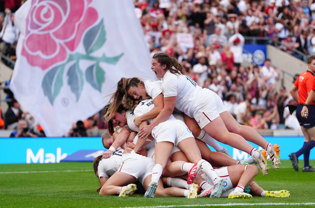 England celebrate the winning try during the WXV Global Series match between England and New Zealand in London, Saturday Sept. 26, 2026. (David Davies/PA via AP)
