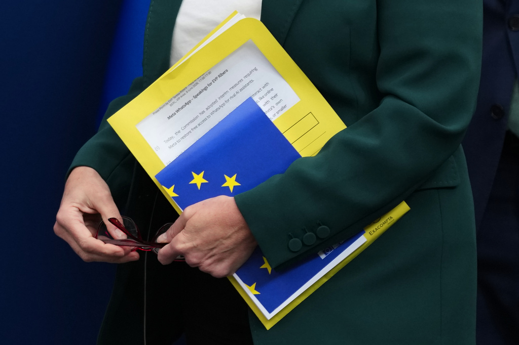 European Commissioner for a Clean, Just and Competitive Transition Teresa Ribera carries her papers as she arrives for a media conference regarding a competition case at EU headquarters in Brussels, Tuesday, June 9, 2026. (AP Photo/Virginia Mayo)