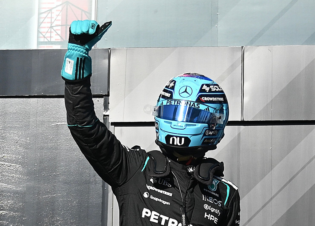 Mercedes driver George Russell of Britain, celebrates after taking pole following the sprint qualifying session at the F1 Canadian Grand Prix auto race in Montreal, Friday, May 22, 2026. (Graham Hughes/The Canadian Press via AP)