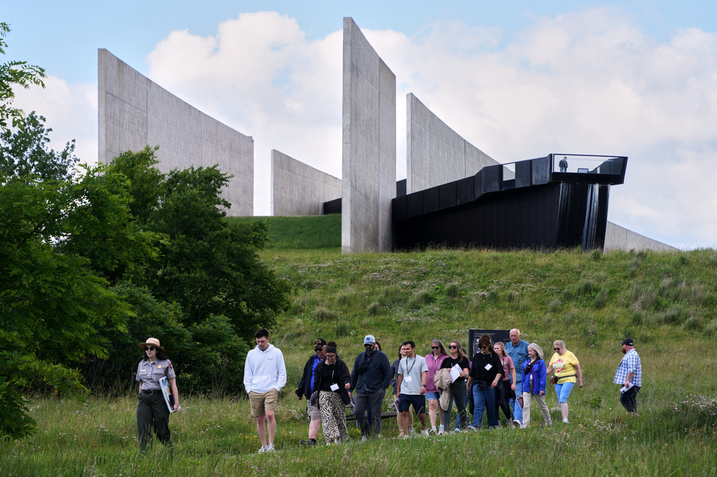 U.S. Park Ranger Claire Affinito, left, leads a tour for a group of educators at the Flight 93 National Memorial in Shanksville, Pa., Tuesday, June 23, 2026. (AP Photo/Gene J. Puskar)