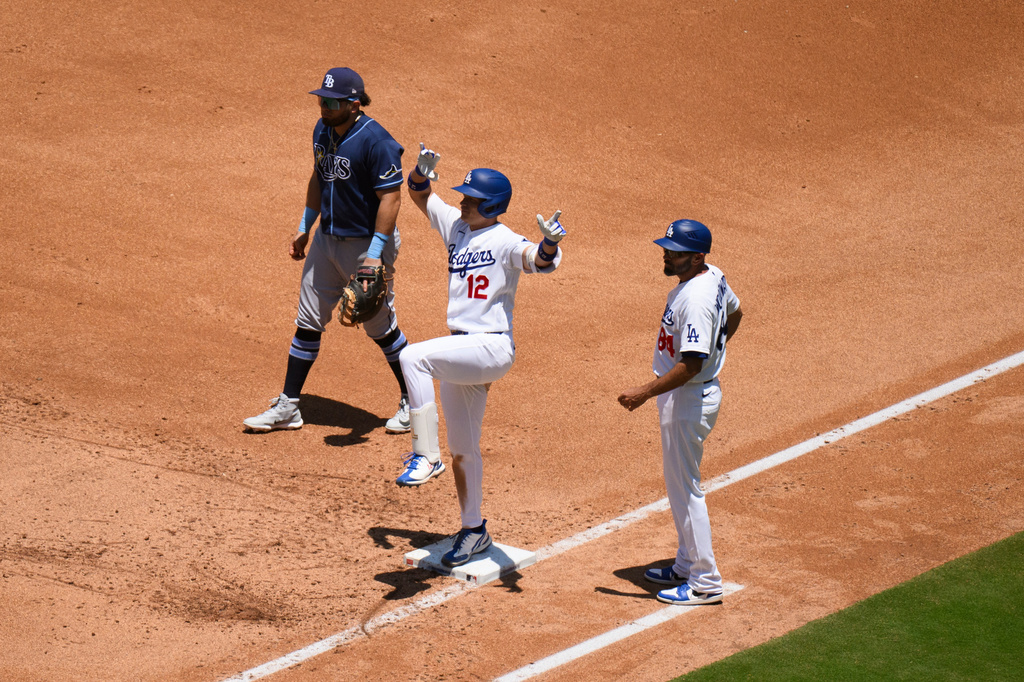Los Angeles Dodgers' Alex Call, center, celebrates his RBI single during the fourth inning of a baseball game against the Tampa Bay Rays in Los Angeles, Wednesday, June 17, 2026. (AP Photo/Kyusung Gong)