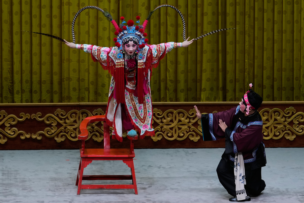 Peking Opera actress Zhang Wanting performs during a show at Jixiang Theatre in Beijing, China, Sunday, Sept. 7, 2025. (AP Photo/Mahesh Kumar A.)
