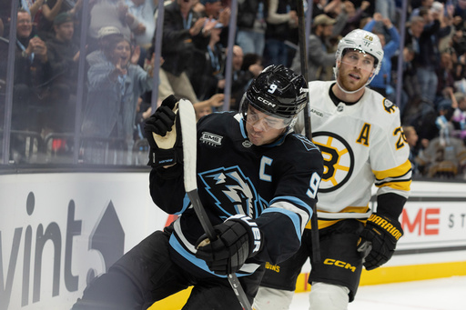 Utah Mammoth center Clayton Keller (9) celebrates the goal against Boston Bruins during the second period of an NHL hockey game Sunday, Oct. 19, 2025, in Salt Lake City. (AP Photo/Melissa Majchrzak) Utah Mammoth center Clayton Keller (9) celebrates the goal against Boston Bruins during the second period of an NHL hockey game Sunday, Oct. 19, 2025, in Salt Lake City. (AP Photo/Melissa Majchrzak)