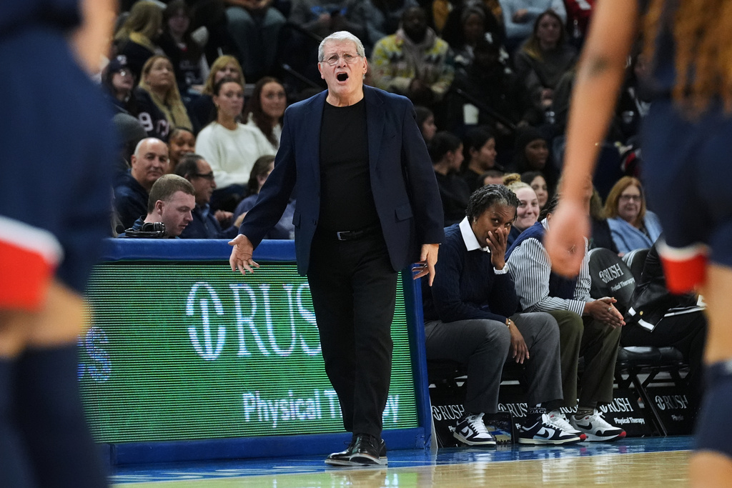 UConn head coach Geno Auriemma calls players during the first half of an NCAA college basketball game against DePaul in Chicago, Wednesday, Feb. 4, 2026. (AP Photo/Nam Y. Huh)