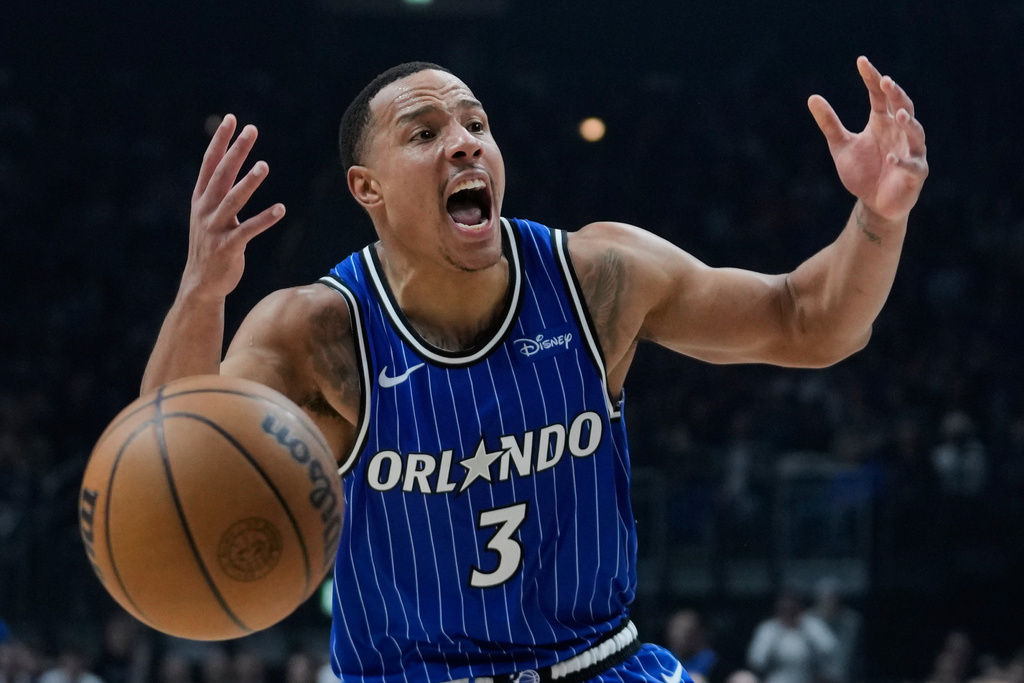 Orlando Magic guard Desmond Bane (3) reacts during an NBA basketball game between Orlando Magic and Memphis Grizzlies in Berlin, Germany, Thursday, Jan. 15, 2026. (AP Photo/Ebrahim Noroozi)