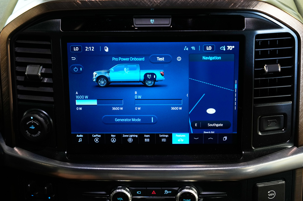 A Pro Power onboard information screen is displayed on a Ford F-150 King Ranch, Wednesday, July 22, 2026, in Southgate, Mich. An available adapter makes the vehicle compatible to plug into a longer, separate cable that connects to a transfer switch installed directly on one's electric meter. (AP Photo/Paul Sancya)