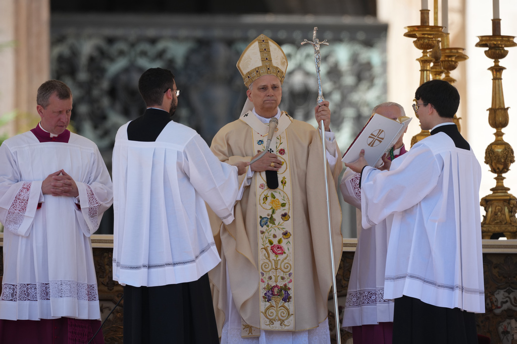 Pope Leo XIV presides over Easter Mass in St. Peter's Square at the Vatican, Sunday, April 5, 2026 (AP Photo/Andrew Medichini)