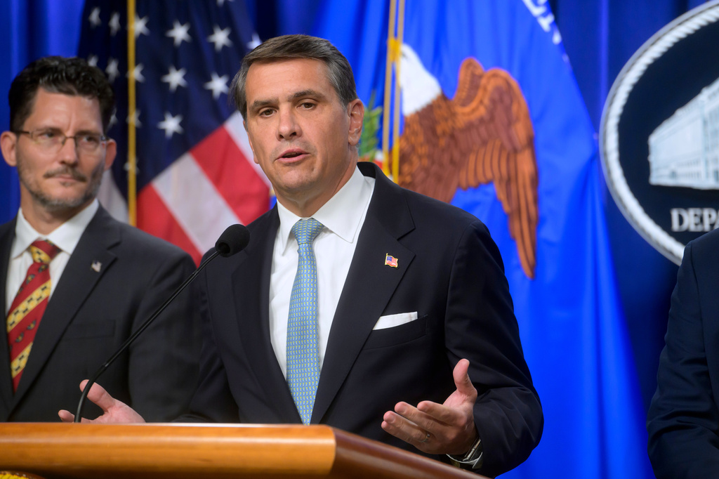 Acting Attorney General Todd Blanche, right, is joined by Deputy Assistant Secretary of the Department of State's Bureau of International Narcotics and Law Enforcement Affairs, Ambassador Michael C. Gonzales, left, during a news conference at the Department of Justice, Wednesday, August 5, 2026 in Washington. (AP Photo/Rod Lamkey, Jr.)