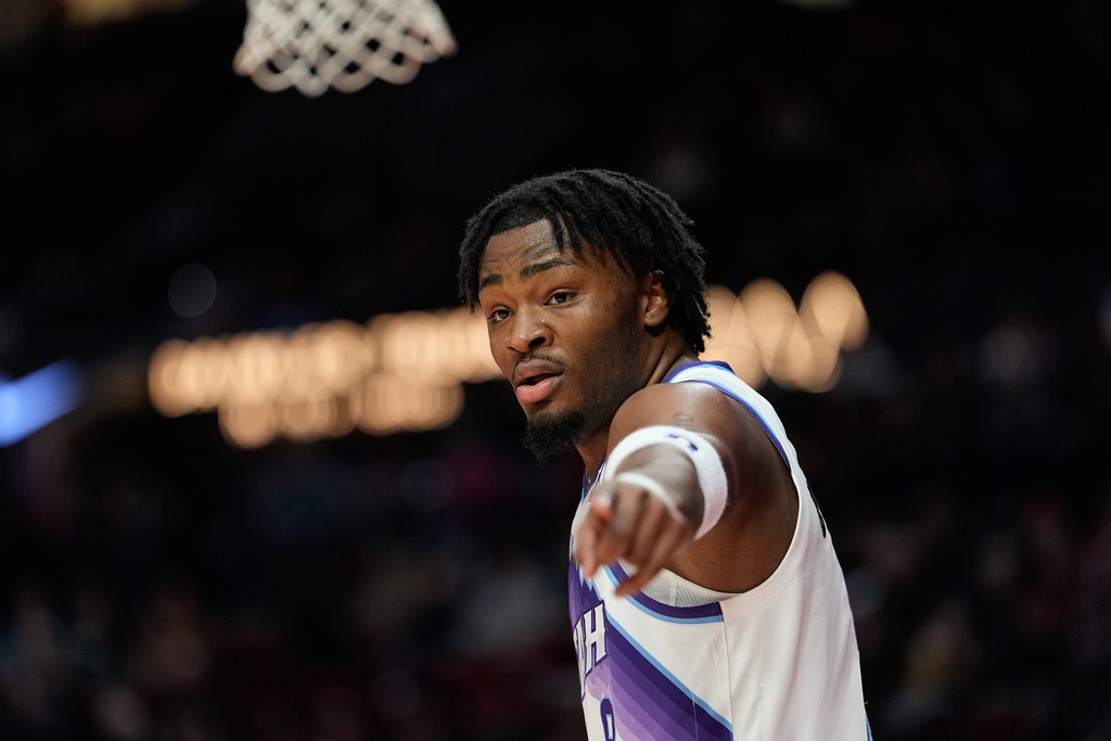 Utah Jazz guard Isaiah Collier reacts during the first half of an NBA basketball game against the Portland Trail Blazers, Friday, March 13, 2026, in Portland, Ore. (AP Photo/Jenny Kane)