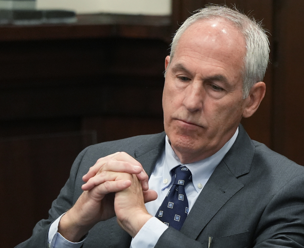 Defendant ex-FirstEnergy Senior Vice President Michael Dowling watches a live transcription of an in chamber conference on a jury question in Summit County Common Pleas Judge Susan Baker Ross' courtroom in Akron, Ohio, on Tuesday, March 31, 2026. (Mike Cardew /Akron Beacon Journal via AP, Pool)