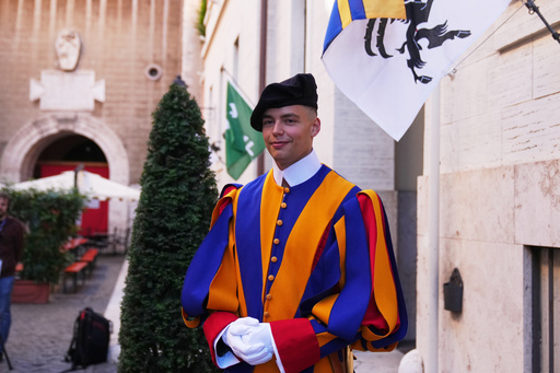 Dario, a new Swiss Guard poses for photos in the Swiss Guard Barracks at the Vatican, Thursday, Oct. 2, 2025. (AP Photo/Alessandra Tarantino) Dario, a new Swiss Guard poses for photos in the Swiss Guard Barracks at the Vatican, Thursday, Oct. 2, 2025. (AP Photo/Alessandra Tarantino)