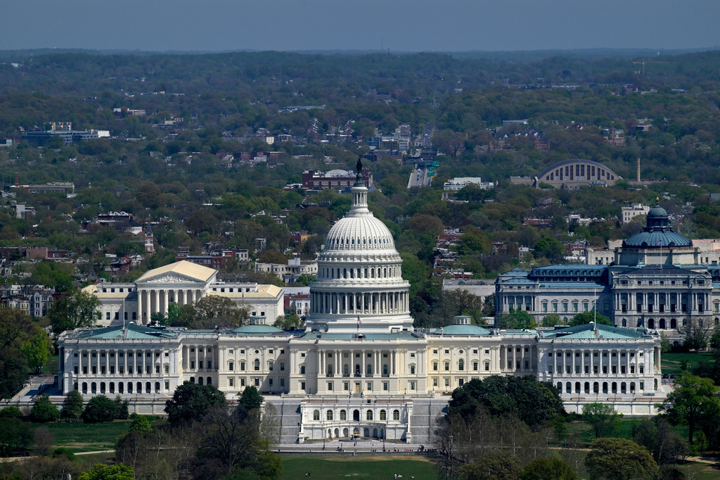 The U.S. Capitol, center, is seen with the Supreme Court of the United States, left, and the Library of Congress, right, Thursday, April 9, 2026, in Washington. (AP Photo/Rod Lamkey, Jr.)