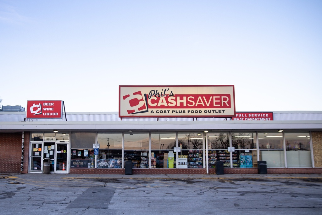 CORRECTS PHOTOGRAPHER A general view of Phil's Cashsaver is seen where a shooting had occurred earlier that morning, in Omaha, Neb., Wednesday, Dec. 3, 2025. (Matthew Mueller/Omaha World-Herald via AP)