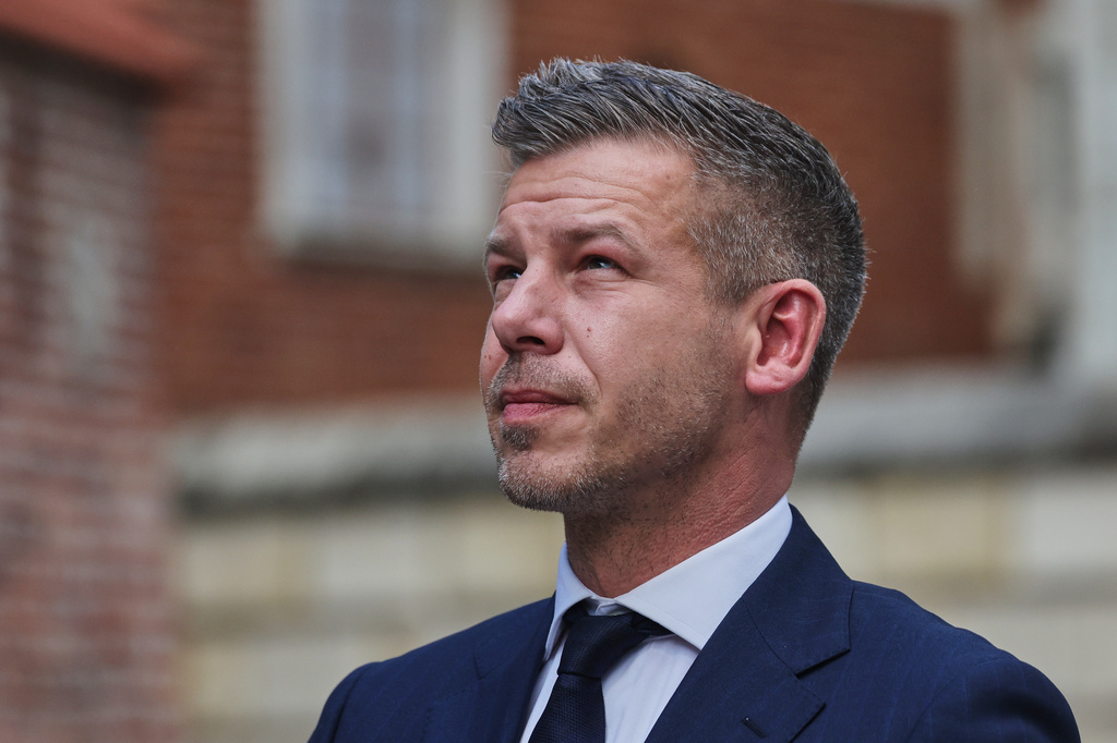 Hungarian Prime Minister Peter Magyar, center, arrives at the Wawel Cathedral during his visit in Krakow, Poland Tuesday, May 19, 2026. (AP Photo/Beata Zawrzel)