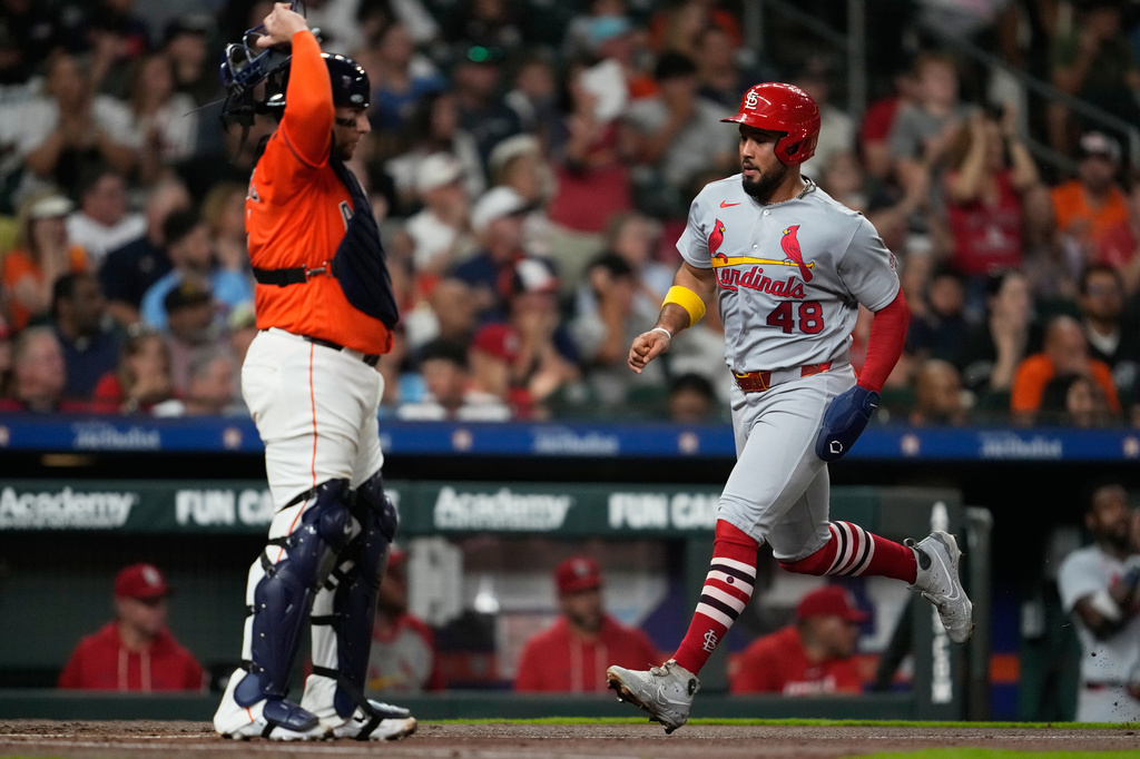 St. Louis Cardinals designated hitter Iván Herrera (48) scores during the third inning of a baseball game against the Houston Astros in Houston, Friday, April 17, 2026. (AP Photo/Ashley Landis)