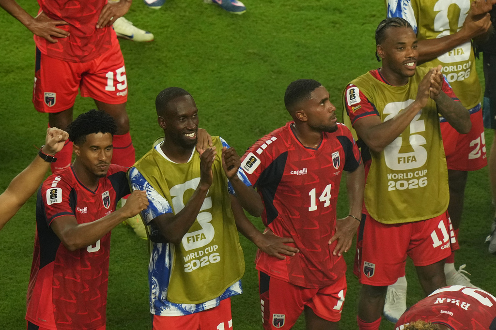 Cape Verde players celebrate after the World Cup Group H soccer match against Uruguay in Miami Gardens, Fla., Sunday, June 21, 2026. (AP Photo/Marta Lavandier)
