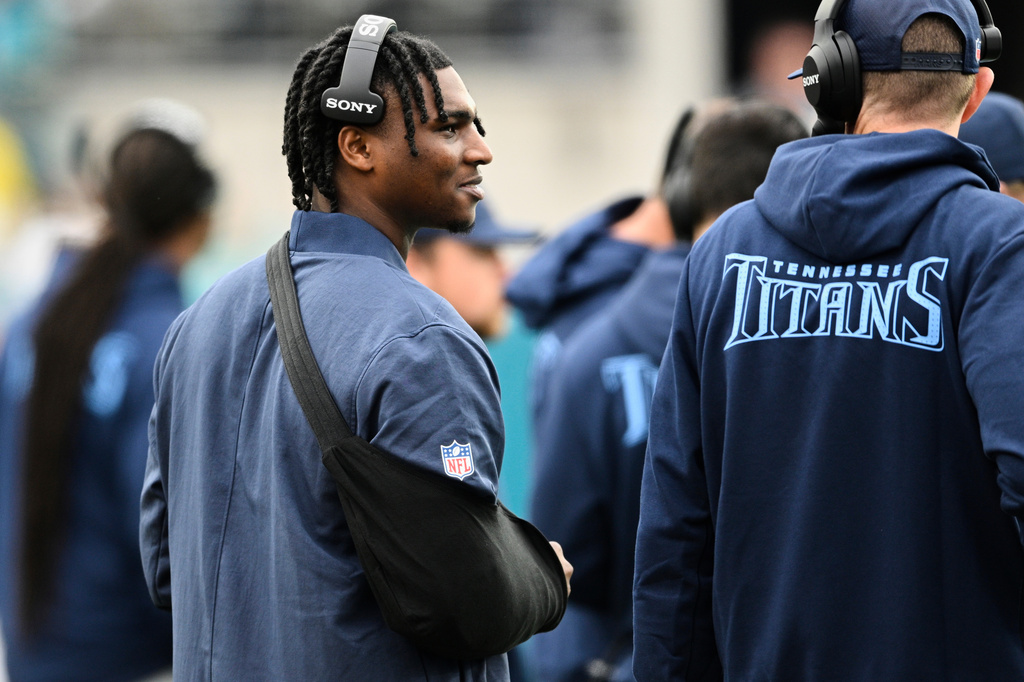 Tennessee Titans quarterback Cam Ward stands on the sideline during the second half of an NFL football game against the Jacksonville Jaguars, Sunday, Jan. 4, 2026, in Jacksonville, Fla. (AP Photo/Phelan M. Ebenhack)