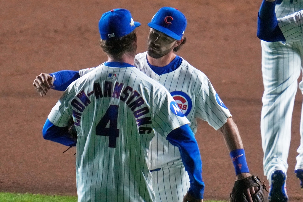 Chicago Cubs' Pete Crow-Armstrong and Dansby Swanson celebrate after Game 3 of a National League wild card baseball game against the San Diego Padres Thursday, Oct. 2, 2025, in Chicago. (AP Photo/Erin Hooley)