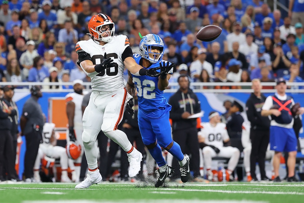 Detroit Lions safety Brian Branch (32) breaks up a pass intended for Cleveland Browns tight end Blake Whiteheart (86) during the second half of an NFL football game, Sunday, Sept. 28, 2025, in Detroit. (AP Photo/Rey Del Rio)