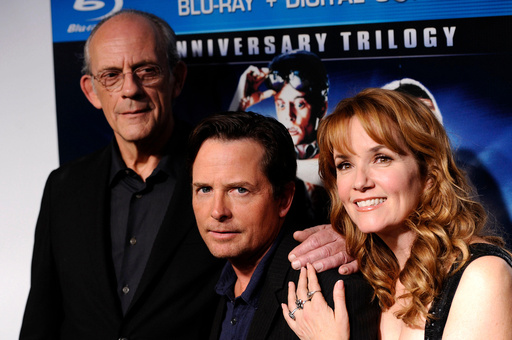 FILE - Castmembers Christopher Lloyd, from left, Michael J. Fox and Lea Thompson appear at the "Back To The Future" 25th anniversary reunion in New York on Oct. 25, 2010. (AP Photo/Peter Kramer, File) FILE - Castmembers Christopher Lloyd, from left, Michael J. Fox and Lea Thompson appear at the "Back To The Future" 25th anniversary reunion in New York on Oct. 25, 2010. (AP Photo/Peter Kramer, File)