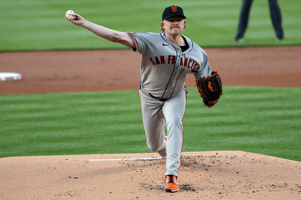 San Francisco Giants pitcher Logan Webb throws during the first inning of a baseball game against the Washington Nationals, Friday, April 17, 2026, in Washington. (AP Photo/Daniel Kucin Jr.)
