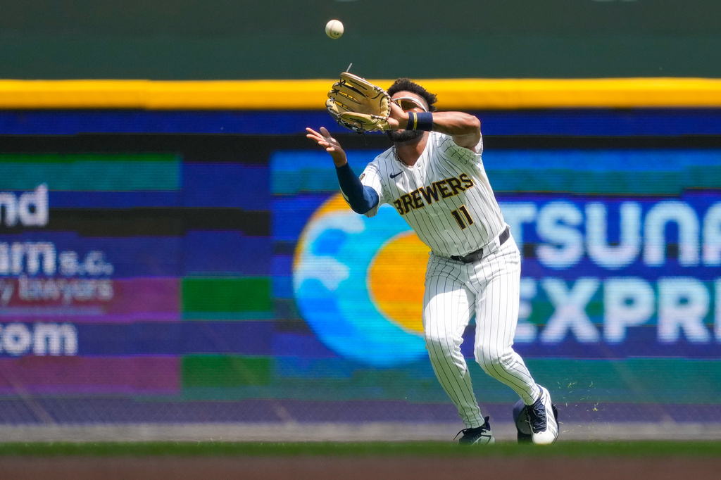 Milwaukee Brewers left fielder Jackson Chourio catches a fly ball hit by Miami Marlins' Liam Hicks during the second inning of a baseball game Sunday, July 19, 2026, in Milwaukee. (AP Photo/Kayla Wolf)
