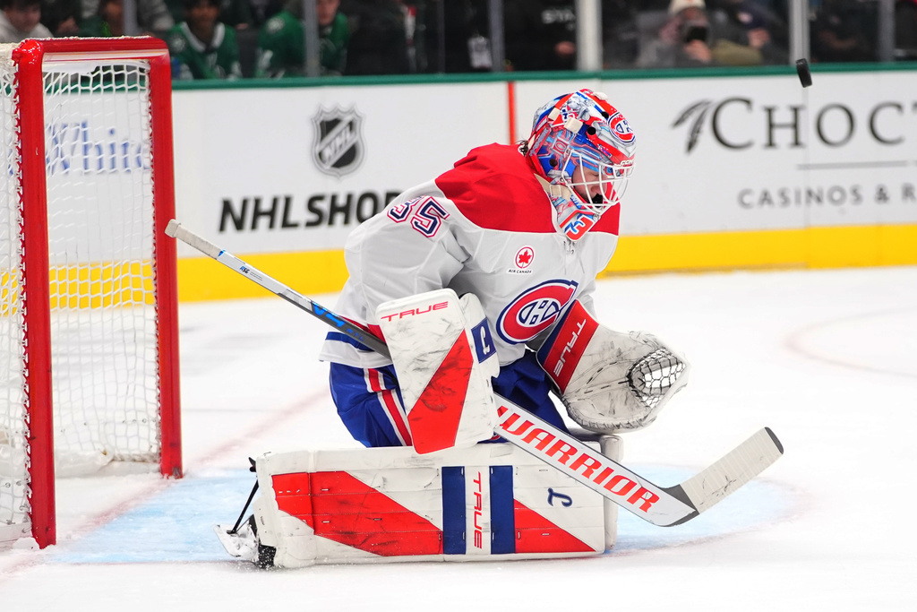 Montréal Canadiens goaltender Samuel Montembeault defends the goal during the first period of an NHL hockey game against the Dallas Stars, Sunday, Jan. 4, 2026, in Dallas. (AP Photo/LM Otero)