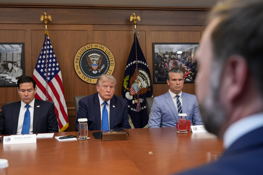 Secretary of State Marco Rubio, from left, President Donald Trump and Defense Secretary Pete Hegseth listen as Vice President JD Vance speaks during a cabinet meeting, Friday, July 31, 2026, at Camp David, the presidential retreat, near Thurmont, Md., Friday, July 31, 2026. (AP Photo/Jacquelyn Martin)