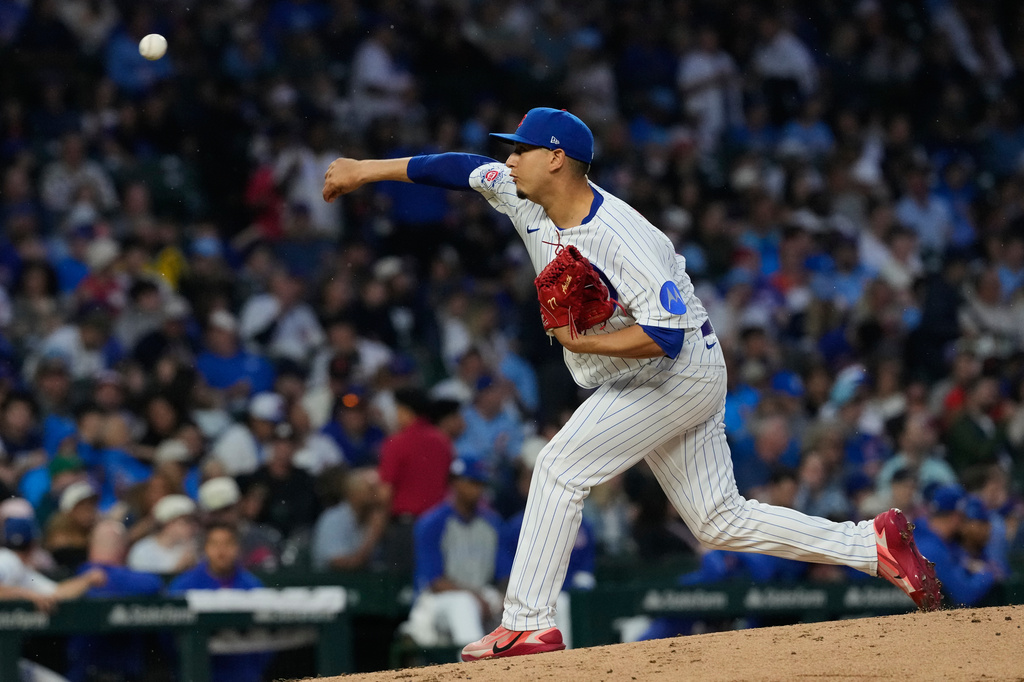 Chicago Cubs starting pitcher Javier Assad throws against the San Francisco Giants during the second inning of a baseball game in Chicago, Sunday, June 7, 2026. (AP Photo/Nam Y. Huh)