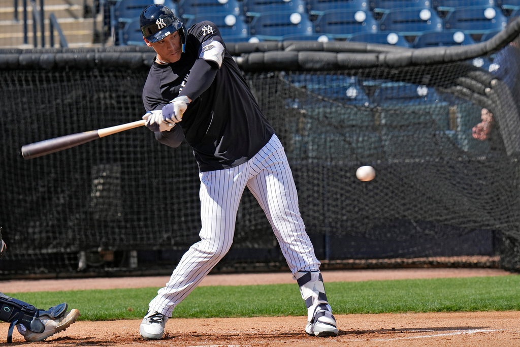 New York Yankees' Aaron Judge hits live pitching during a spring training baseball workout on Thursday, Feb. 12, 2026, in Tampa, Fla. (AP Photo/Chris O'Meara)