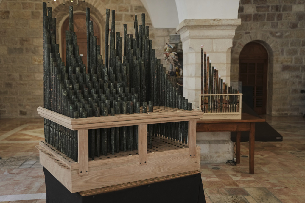 An 11th-century organ that researchers say is the oldest in the Christian world was played for the first time in 800 years after restoration, is on display in Saint Savior's Monastery of Jerusalem's Old City, Tuesday, Sept. 9, 2025. (AP Photo/Mahmoud Illean)
