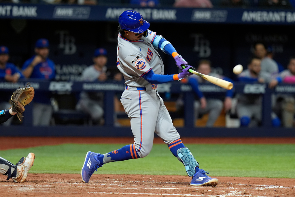 New York Mets' Mark Vientos connects for a home run off Tampa Bay Rays pitcher Ian Seymour during the seventh inning of a baseball game Monday, Aug. 31, 2026, in St. Petersburg, Fla. (AP Photo/Chris O'Meara)