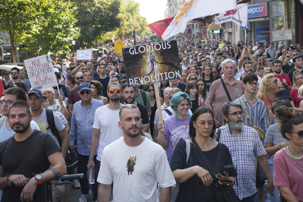 Led by university students, people attend a protest against increasing police brutality in Belgrade, Serbia, Monday, Sept. 8, 2025. (AP Photo/Darko Vojinovic)