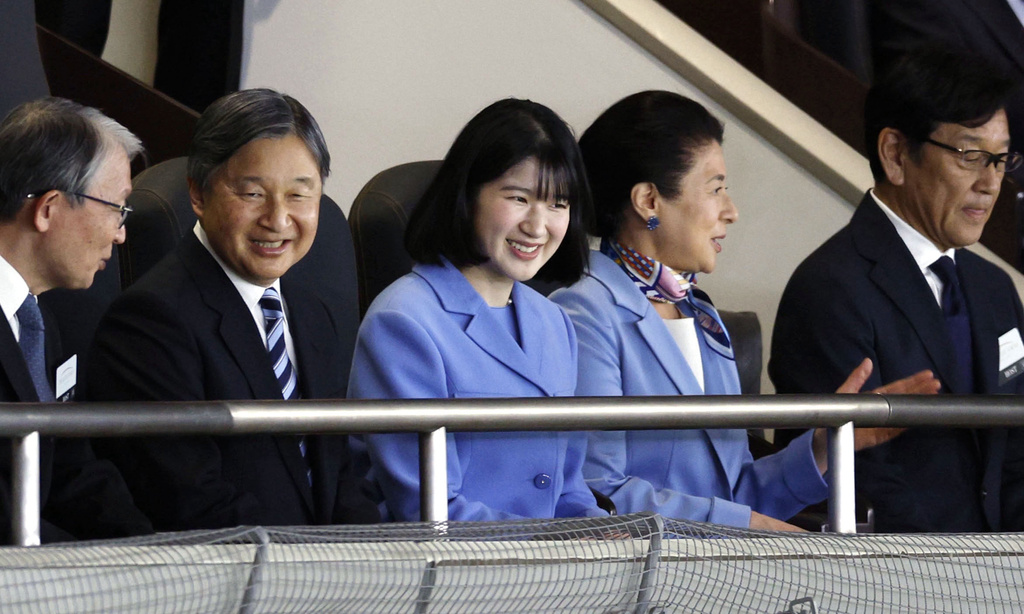 Japan's Emperor Naruhito, second left, Empress Masako, second right, and their daughter Princess Aiko watch a World Baseball Classic game between Japan and Australia, together with Hideki Kuriyama, right, manager of Team Japan that won the 2023 World Baseball Classic championship, in Tokyo Sunday, March 8, 2026. (Suo Gakekuma/Kyodo News via AP)