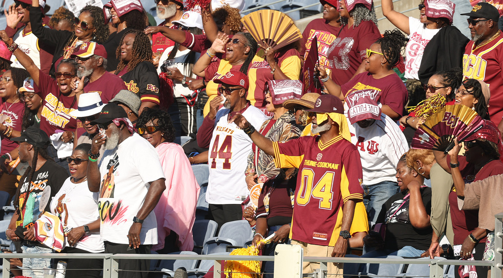Fans cheer before the start of an NCAA college football game of Bethune-Cookman versus Florida A&M in Orlando, Fla., Saturday, Nov. 22, 2025. (Stephen M. Dowell/Orlando Sentinel via AP)
