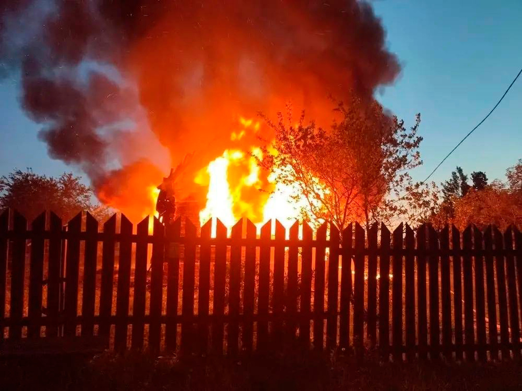 This photo released by Moscow Region Governor Andrei Vorobyev's official telegram channel shows a house on fire after a Ukrainian attack in Khimki, just outside Moscow, Russia, on Sunday, May 17, 2026. (Moscow Region Governor Andrei Vorobyev's official telegram channel via AP)