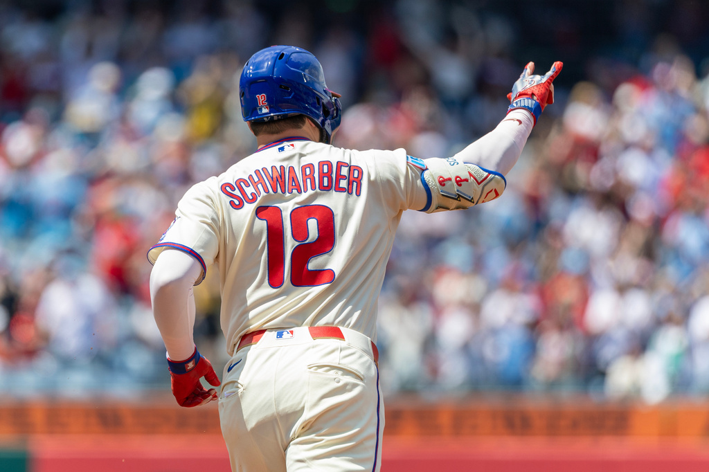 Philadelphia Phillies' Kyle Schwarber gestures while rounding second base after hitting a solo home run in the first inning of a baseball game against the Colorado Rockies, Sunday, May 10, 2026, in Philadelphia. (AP Photo/Laurence Kesterson)