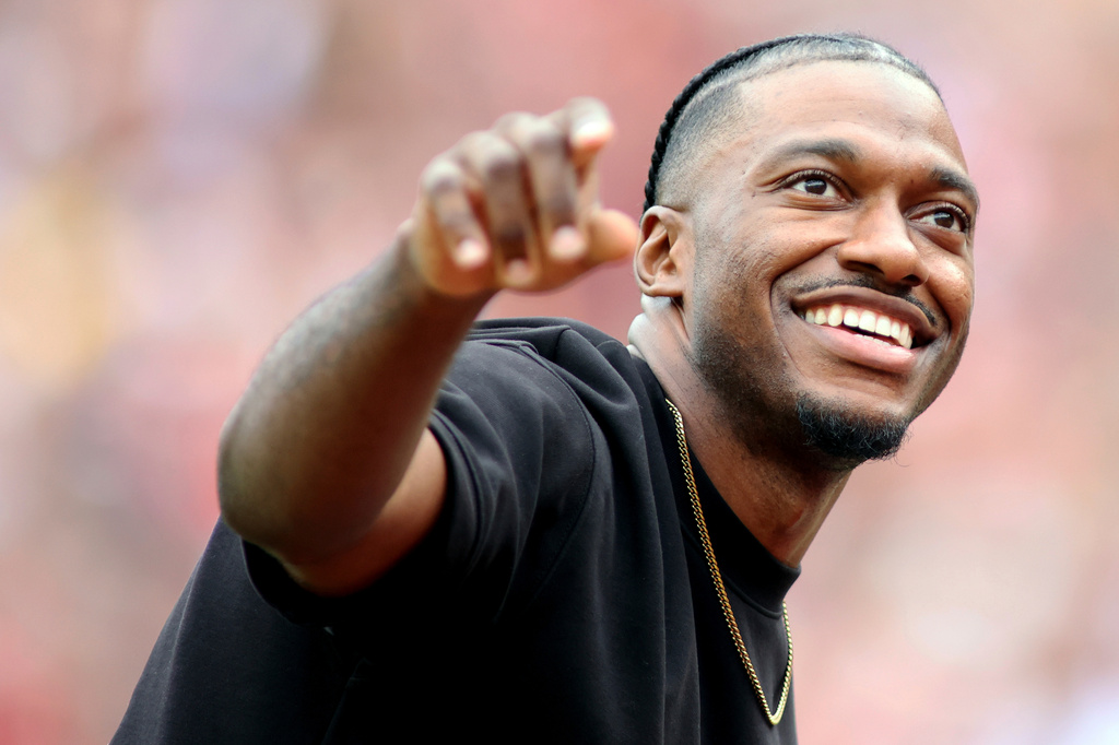 FILE - Former Washington Commanders quarterback Robert Griffin III is honored during an NFL football game against the Arizona Cardinals, Sept. 10, 2023 in Landover, Md. (AP Photo/Daniel Kucin Jr., File)