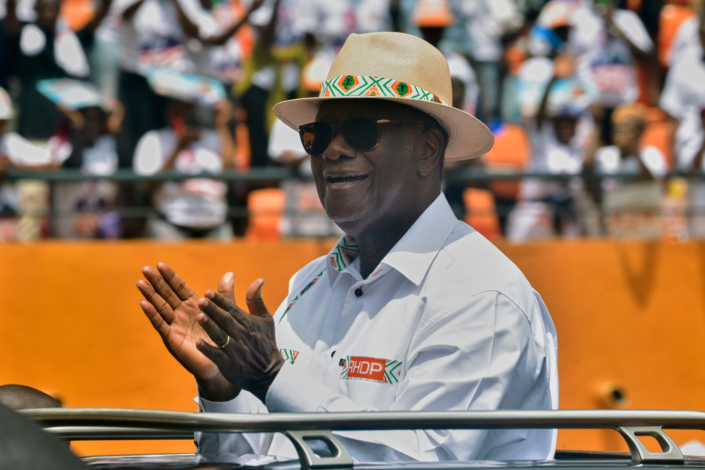 President Alassane Ouattara arrives at a campaign rally at the Félix Houphouët-Boigny Stadium in Abidjan, Ivory Coast, Saturday, Oct. 18, 2025. (AP Photo/Diomande Ble Blonde)