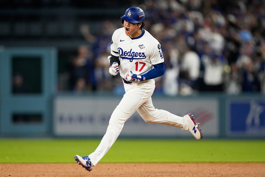 FILE - Los Angeles Dodgers' Shohei Ohtani celebrates his home run against the Toronto Blue Jays during the seventh inning in Game 3 of baseball's World Series, Monday, Oct. 27, 2025, in Los Angeles. (AP Photo/Brynn Anderson, File)